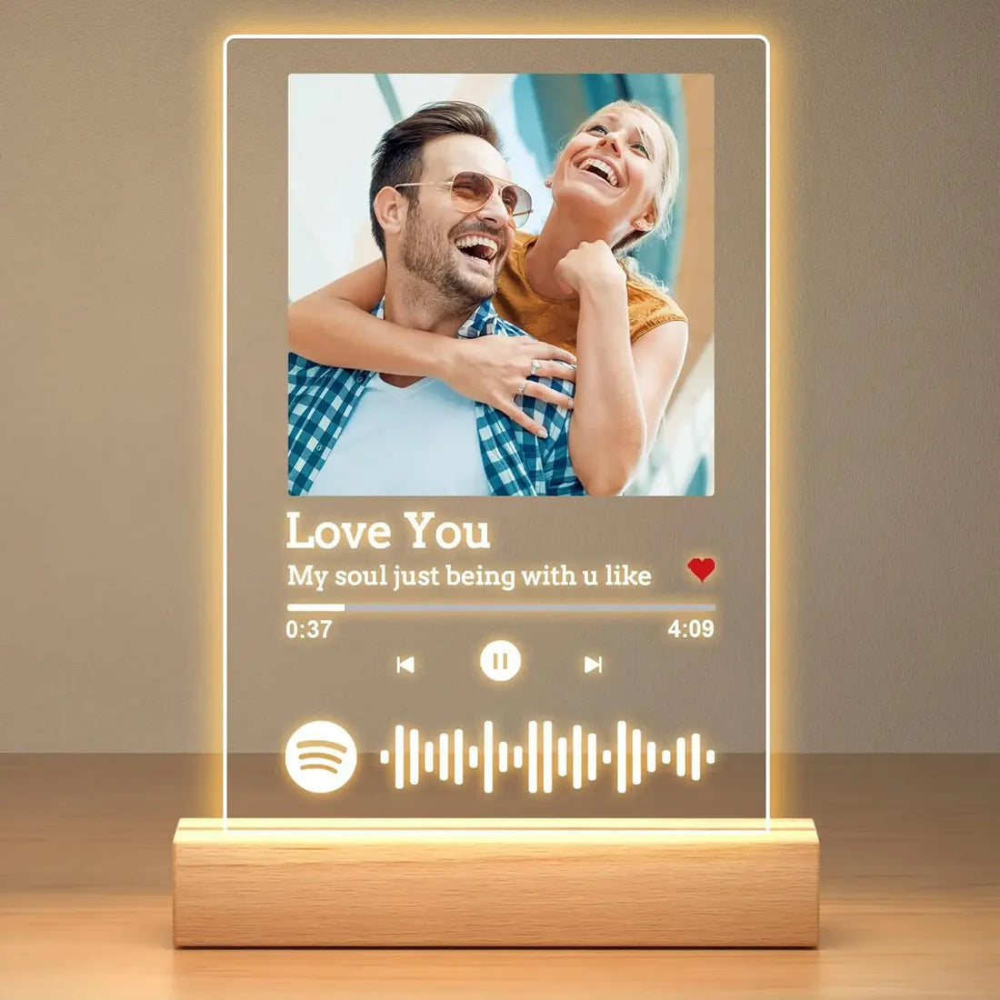 Lit plaque with a photo of a couple, the words Love You and the waveform of their song.